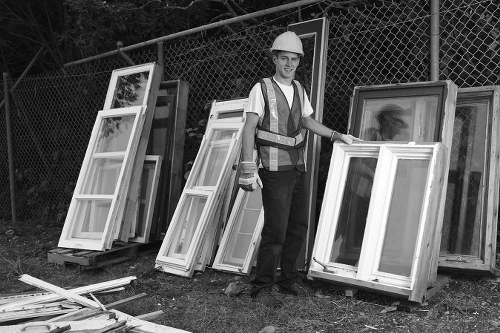 Flat clearance team organizing items in Anerley flat